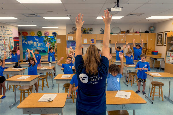FLIPANY instructor in the classroom with kids for nutrition education